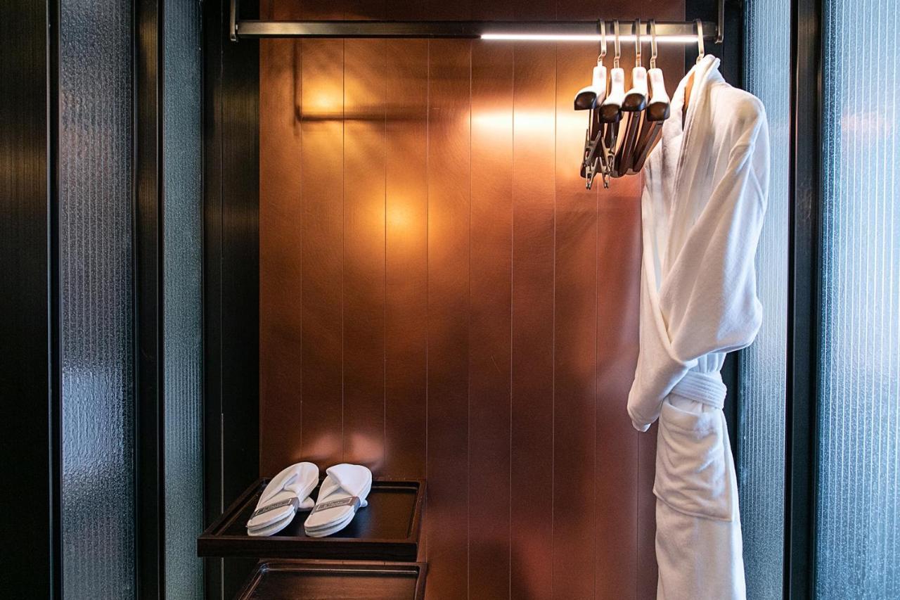 فندق Mumian Beijing Daxing International Airport, Part Of Hyatt المظهر الخارجي الصورة A bathrobe and slippers in a hotel room